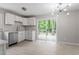Contemporary kitchen with stainless steel appliances and sliding glass doors at 1903 Meadowbrook St, Sanford, NC 27330
