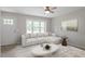 Cozy living room featuring a large window, plush seating, and stylish decor at 1903 Meadowbrook St, Sanford, NC 27330