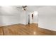 Bright bedroom with hardwood floors and ceiling fan at 1915 Redding Ln, Durham, NC 27712
