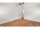 Comfortable bedroom with ceiling fan, hardwood floors, and closet at 1915 Redding Ln, Durham, NC 27712