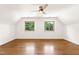 Bright bedroom with hardwood floors and two windows at 1915 Redding Ln, Durham, NC 27712