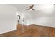 Bright bedroom with hardwood floors and access to a closet at 1915 Redding Ln, Durham, NC 27712