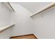 Walk-in closet with ample shelving and hardwood floors at 1915 Redding Ln, Durham, NC 27712