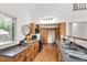 Spacious kitchen with wood cabinets, black appliances, and plenty of counter space at 1915 Redding Ln, Durham, NC 27712