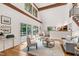 Spacious living area with a modern design, featuring hardwood floors, high ceilings, and abundant natural light at 1915 Redding Ln, Durham, NC 27712