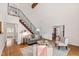Cozy living area with hardwood floors, neutral furniture, and an open layout for easy entertaining at 1915 Redding Ln, Durham, NC 27712