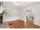 Inviting living room showcasing hardwood floors and a doorway to another room at 1915 Redding Ln, Durham, NC 27712