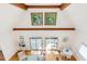 Aerial view of a bright and spacious living room with high ceilings, hardwood floors, and comfortable seating at 1915 Redding Ln, Durham, NC 27712