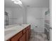 Bathroom with double sink vanity and tile floors at 1928 Grace Point Rd, Morrisville, NC 27560