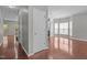 Inviting entryway featuring hardwood floors and neutral paint, leading to living spaces at 1928 Grace Point Rd, Morrisville, NC 27560