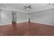 The main bedroom has hardwood floors, a ceiling fan and recessed lighting at 1928 Grace Point Rd, Morrisville, NC 27560