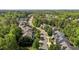 Beautiful street view of a neighborhood with lush green trees surrounding well-maintained homes at 1928 Grace Point Rd, Morrisville, NC 27560