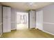 Neutral bedroom with built-in storage and entry to living space at 2021 Sunnybrook Dr, Burlington, NC 27215