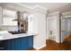 Modern kitchen with stainless steel appliances and bright quartz counters at 2021 Sunnybrook Dr, Burlington, NC 27215
