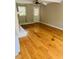 Comfortable living room with wooden floors and a ceiling fan at 2021 Sunnybrook Dr, Burlington, NC 27215