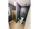Full bathroom featuring a shower, toilet, tile floors and dark blue walls at 2100 Possum Trot Rd, Wake Forest, NC 27587