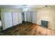 Bedroom featuring wood floors, ceiling fan, and double closets at 2100 Possum Trot Rd, Wake Forest, NC 27587