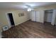 Large bedroom with spacious closet space and wood flooring at 2100 Possum Trot Rd, Wake Forest, NC 27587