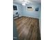 Spacious bedroom with a ceiling fan and dark wood floors at 2100 Possum Trot Rd, Wake Forest, NC 27587