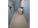 Laundry room with white washer and dryer set, light blue walls, and white cabinets at 2100 Possum Trot Rd, Wake Forest, NC 27587