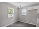 Dining area featuring natural light, neutral paint and wood-look flooring at 2222 Oak Ridge Blvd, Durham, NC 27707