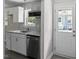Updated kitchen features granite countertops, stainless appliances and white cabinetry at 2222 Oak Ridge Blvd, Durham, NC 27707