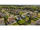 A peaceful neighborhood showcasing neatly kept homes with manicured lawns and fenced yards at 2503 Macdougall Dr, Burlington, NC 27217