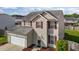 Well-maintained two-story home with attached two-car garage and manicured front yard at 2503 Macdougall Dr, Burlington, NC 27217