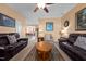 Inviting living room with comfortable seating, neutral paint, and seamless flow into dining space at 2503 Macdougall Dr, Burlington, NC 27217