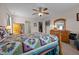 Inviting main bedroom with a comfy quilt bed, dresser, and ceiling fan providing a relaxing space at 2503 Macdougall Dr, Burlington, NC 27217