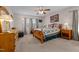 Inviting main bedroom with a comfy quilt bed, dresser, and ceiling fan providing a relaxing space at 2503 Macdougall Dr, Burlington, NC 27217
