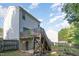 Charming home featuring a spacious backyard and a wooden deck perfect for outdoor entertaining at 2612 Alder Ridge Ln, Raleigh, NC 27603