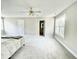 Spacious bedroom with neutral walls and carpet, along with an ensuite bathroom at 2612 Alder Ridge Ln, Raleigh, NC 27603