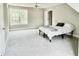 Bedroom features neutral walls and carpet, along with lots of natural light at 2612 Alder Ridge Ln, Raleigh, NC 27603