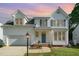 Charming two-story home with a well-manicured lawn and inviting front entrance at 2612 Alder Ridge Ln, Raleigh, NC 27603