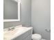 Bathroom with updated vanity, sink, toilet and towel bar at 2708 Tryon Pines Dr, Raleigh, NC 27603