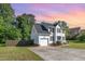 Two-story home features a driveway and attached one car garage at 2708 Tryon Pines Dr, Raleigh, NC 27603