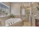 Bathroom features include a corner bathtub with jets, and a glass-framed tile shower at 2723 Cameron Pond Dr, Cary, NC 27519