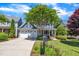 Charming two-story home with a well-manicured lawn, front porch, and a two-car garage at 2723 Cameron Pond Dr, Cary, NC 27519