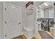 Well-appointed mudroom features built-in storage, bench, and access to laundry room at 2723 Cameron Pond Dr, Cary, NC 27519