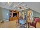 Upstairs office space with wood floors, ceiling fan, and views into the bathroom at 2723 Cameron Pond Dr, Cary, NC 27519