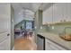 Upstairs office space with white storage cabinets, mini-refrigerator and view into second office at 2723 Cameron Pond Dr, Cary, NC 27519