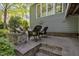 Stone patio with outdoor furniture and a fire pit at 2723 Cameron Pond Dr, Cary, NC 27519