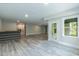 Finished basement with walkout, bar area, and new floors at 273 Scarlet Tanager Cir, Holly Springs, NC 27540