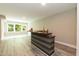 Finished basement bar with lots of light from the window at 273 Scarlet Tanager Cir, Holly Springs, NC 27540