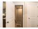 Open doorway reveals stairs leading to the basement, accessible from the kitchen at 273 Scarlet Tanager Cir, Holly Springs, NC 27540