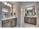 Elegant bathroom with double vanity, neutral paint and recessed lighting at 3004 Dog Rose Dr # 309, Durham, NC 27703
