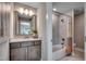 Modern bathroom vanity with granite countertop, undermount sink and tiled shower with tub at 3004 Dog Rose Dr # 309, Durham, NC 27703