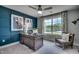 Stylish home office with natural light, desk, and comfortable chair at 3004 Dog Rose Dr # 309, Durham, NC 27703