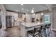Bright and modern kitchen featuring stainless steel appliances, an island, and ample counter space at 3004 Dog Rose Dr # 309, Durham, NC 27703
